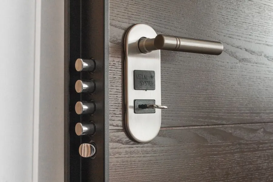 Multipoint lock and lever handle on a wooden door